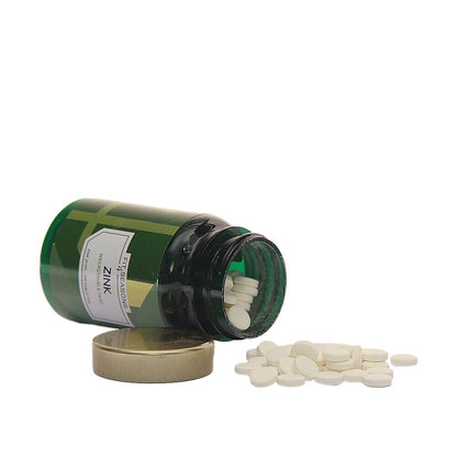 Zink supplement tabletten uitgeschonken uit potje